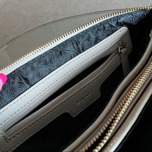 Crossbody purse color cream with multiple pockets on inside from Dune - Picture 7 of 7
